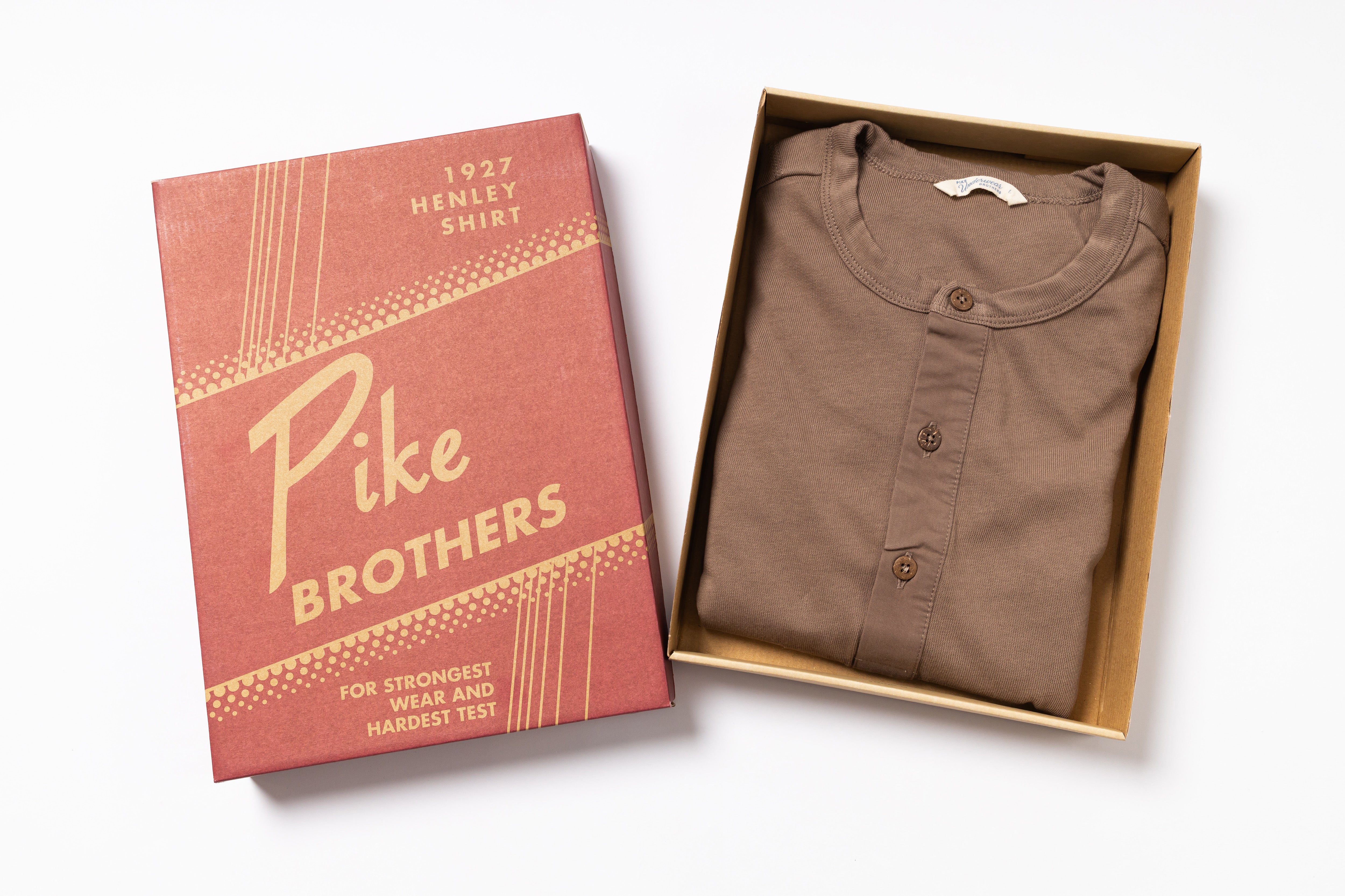 Brown shirt in a box with a Pike Brothers packaging box on a white background