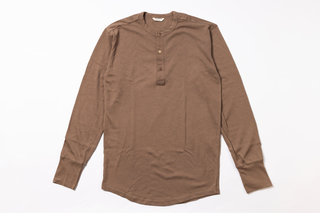 Brown long-sleeve shirt on a white background