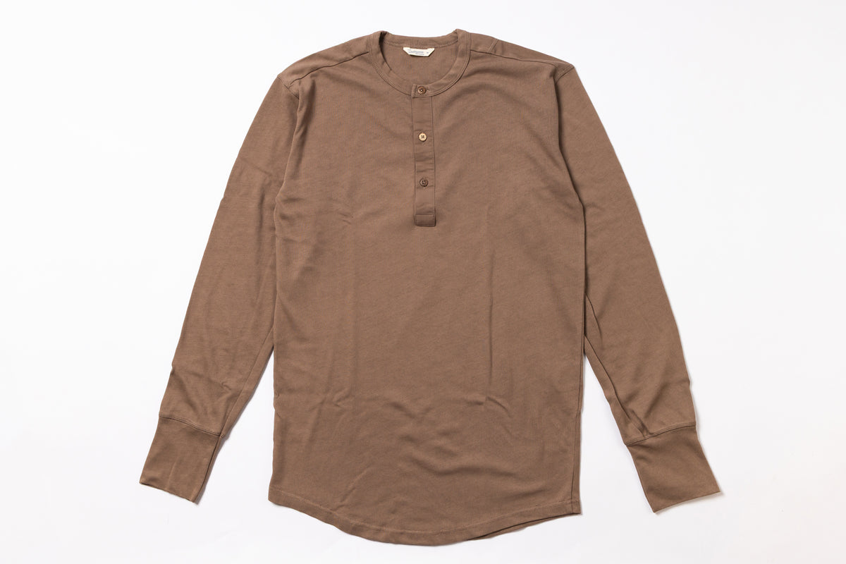 Brown long-sleeve shirt on a white background