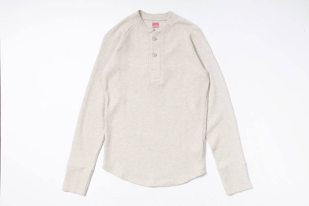 Beige long-sleeve shirt on a white background