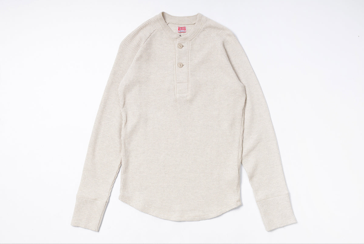 Beige long-sleeve shirt on a white background