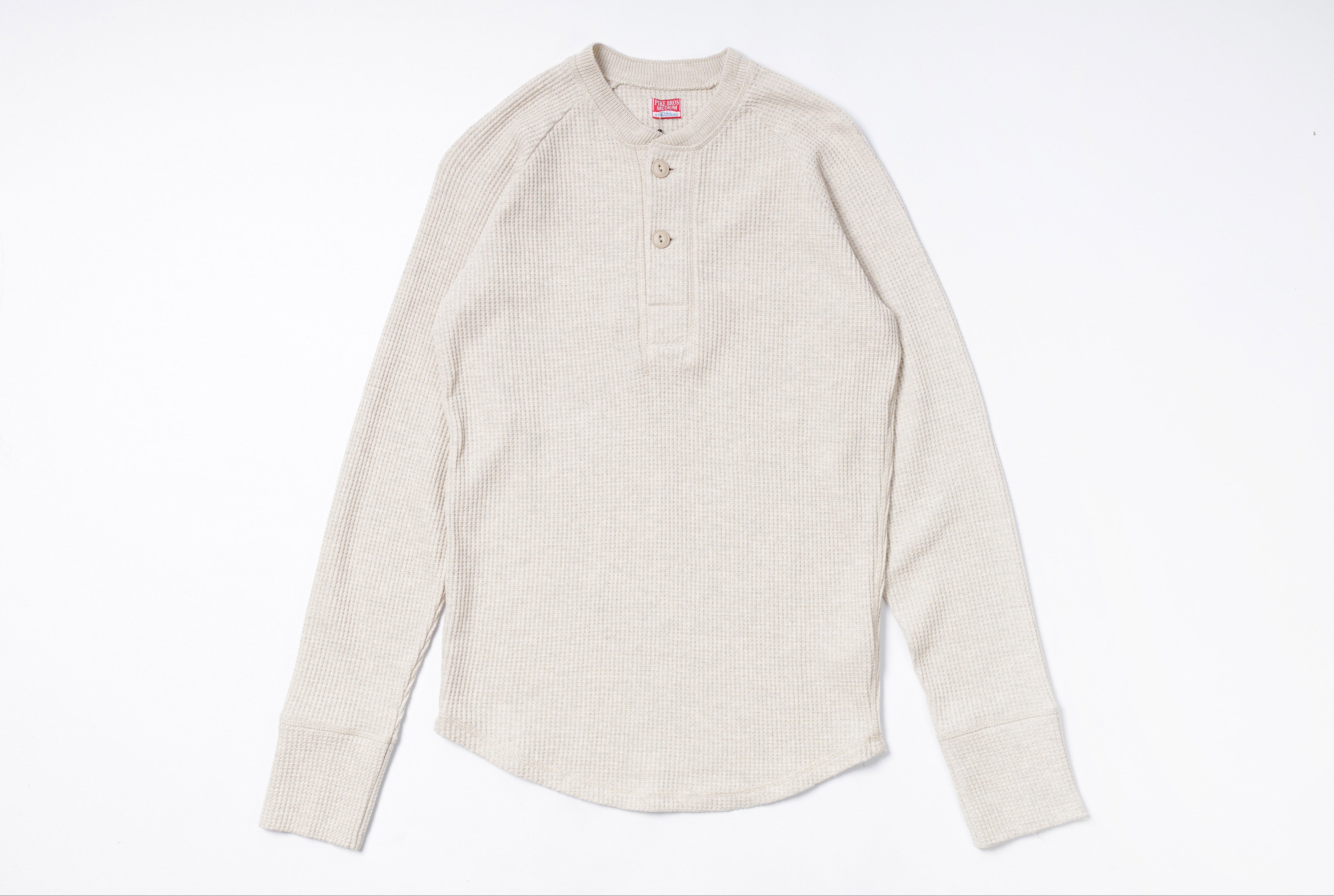Beige long-sleeve shirt on a white background