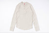 Beige long-sleeve shirt on a white background