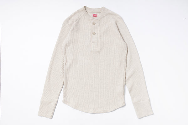 Beige long-sleeve shirt on a white background