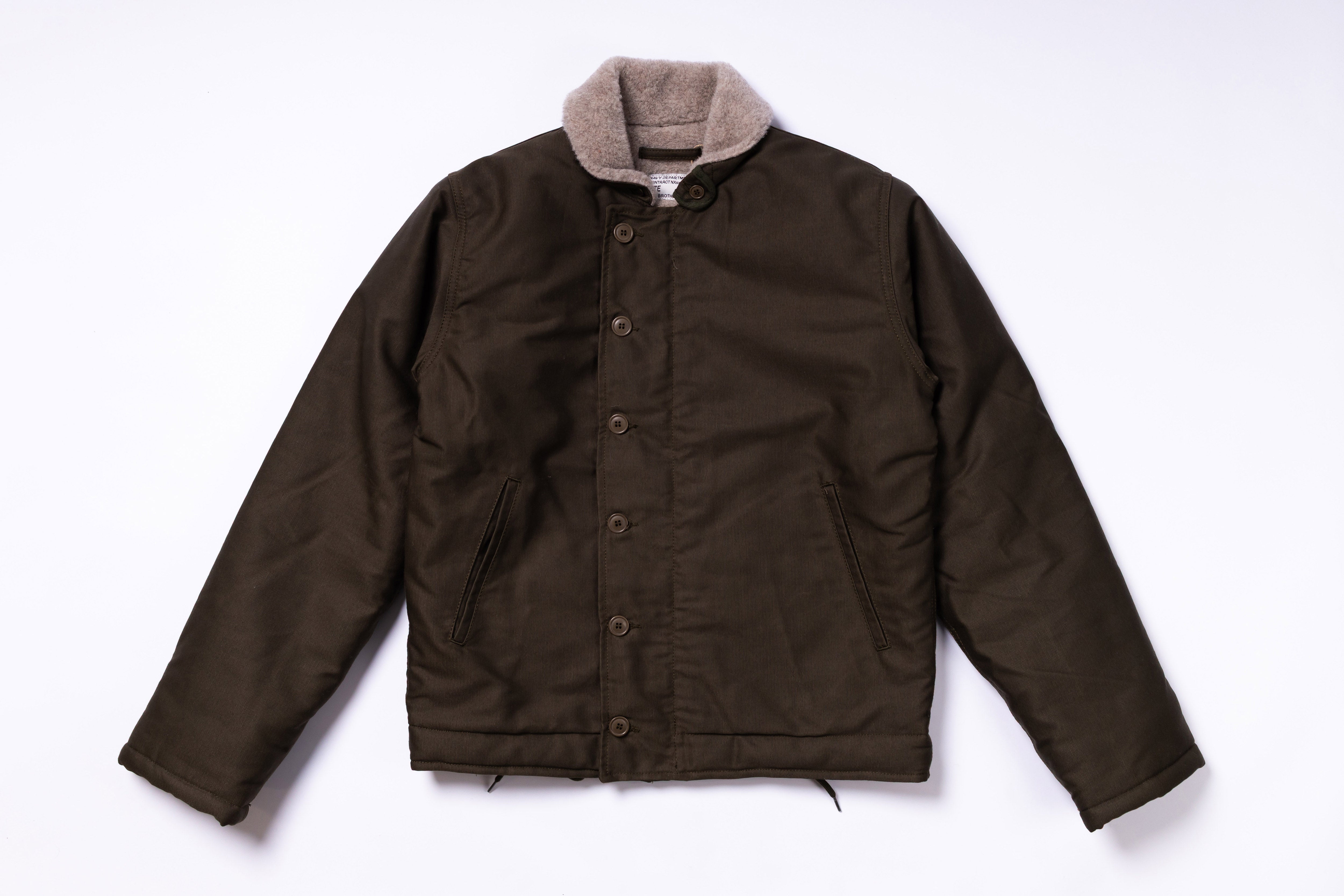 Brown jacket with gray collar on a white background