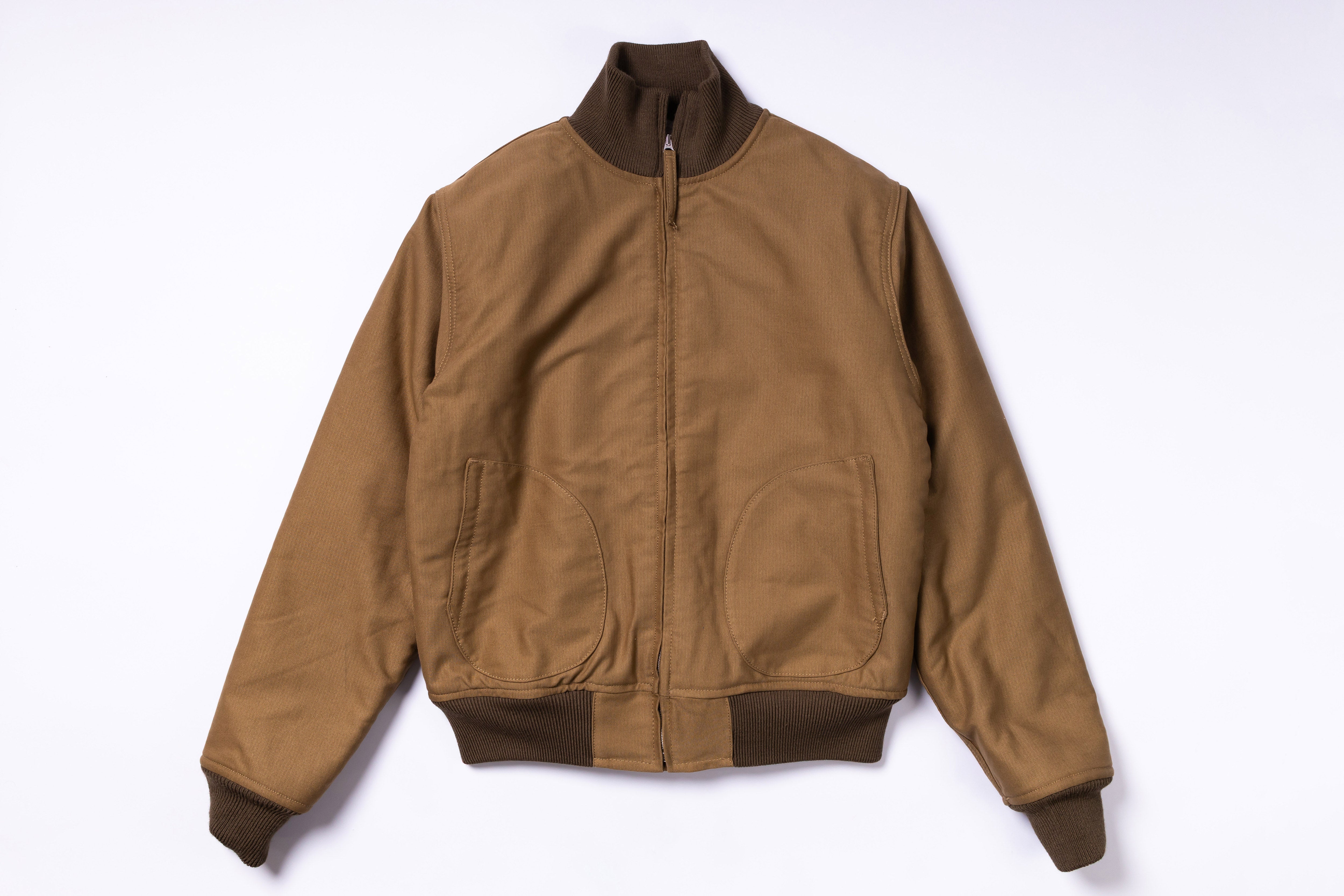 Brown jacket with dark brown collar and cuffs on a white background