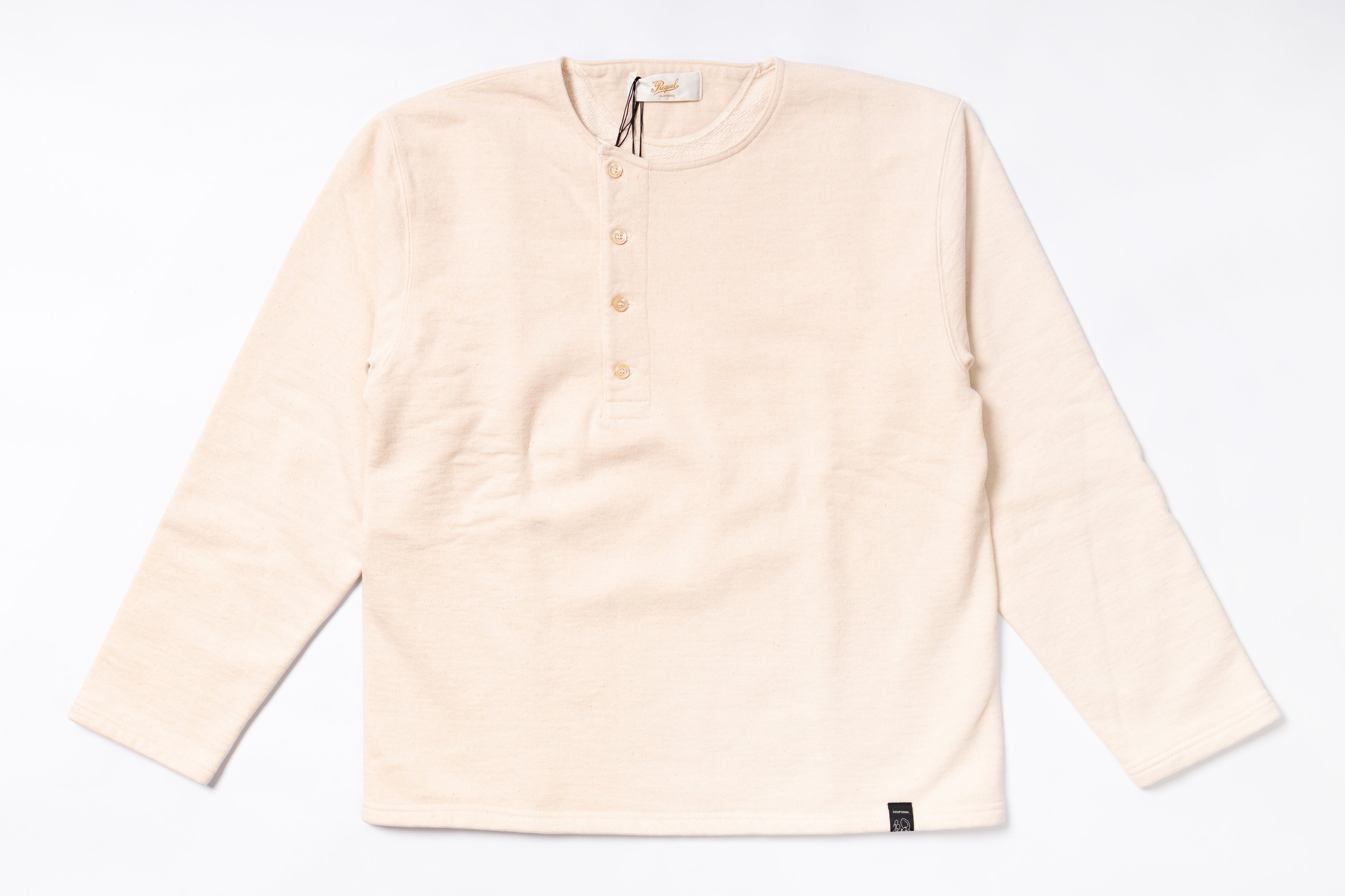 Beige long-sleeve shirt on a white background