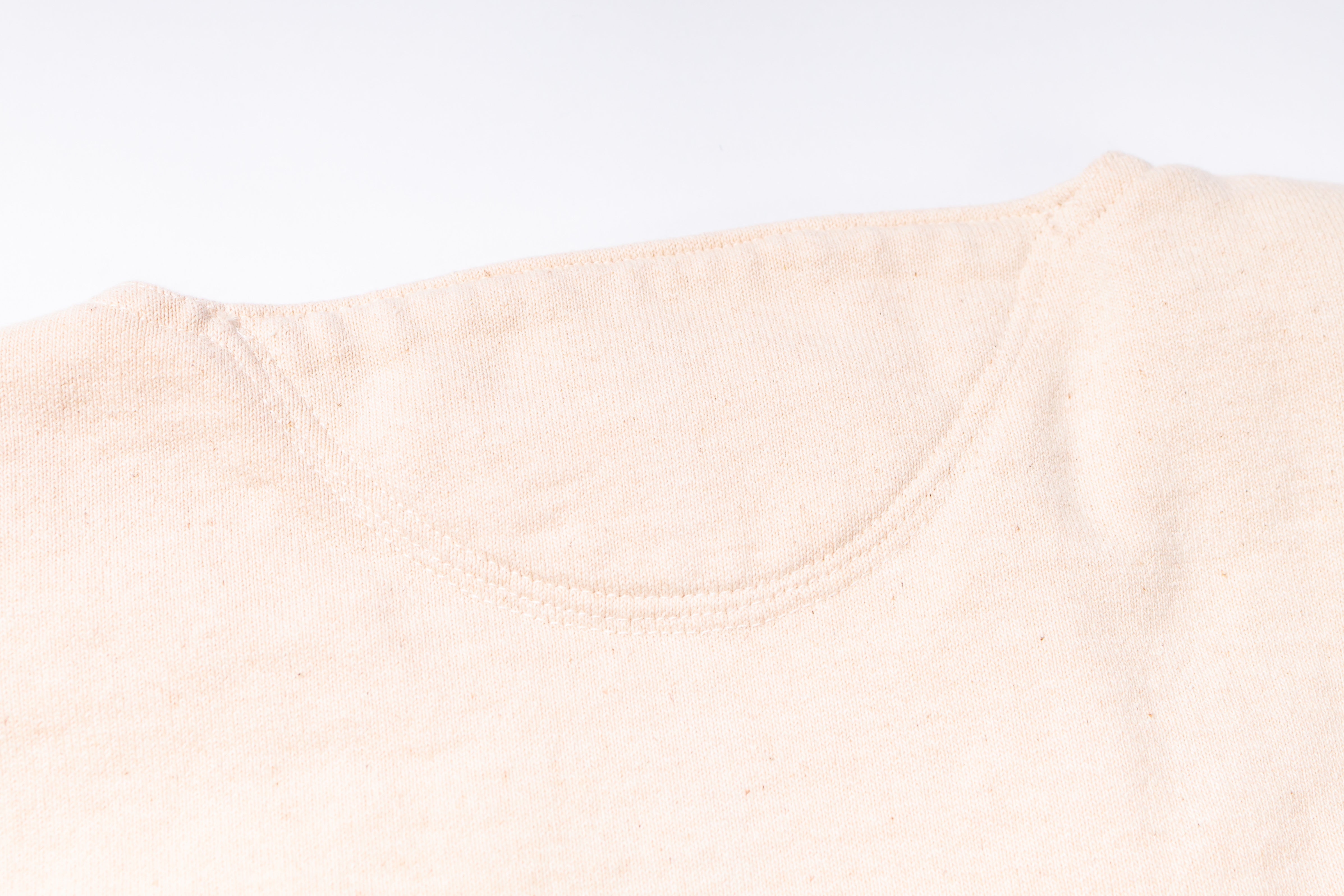 Close-up of a beige fabric texture