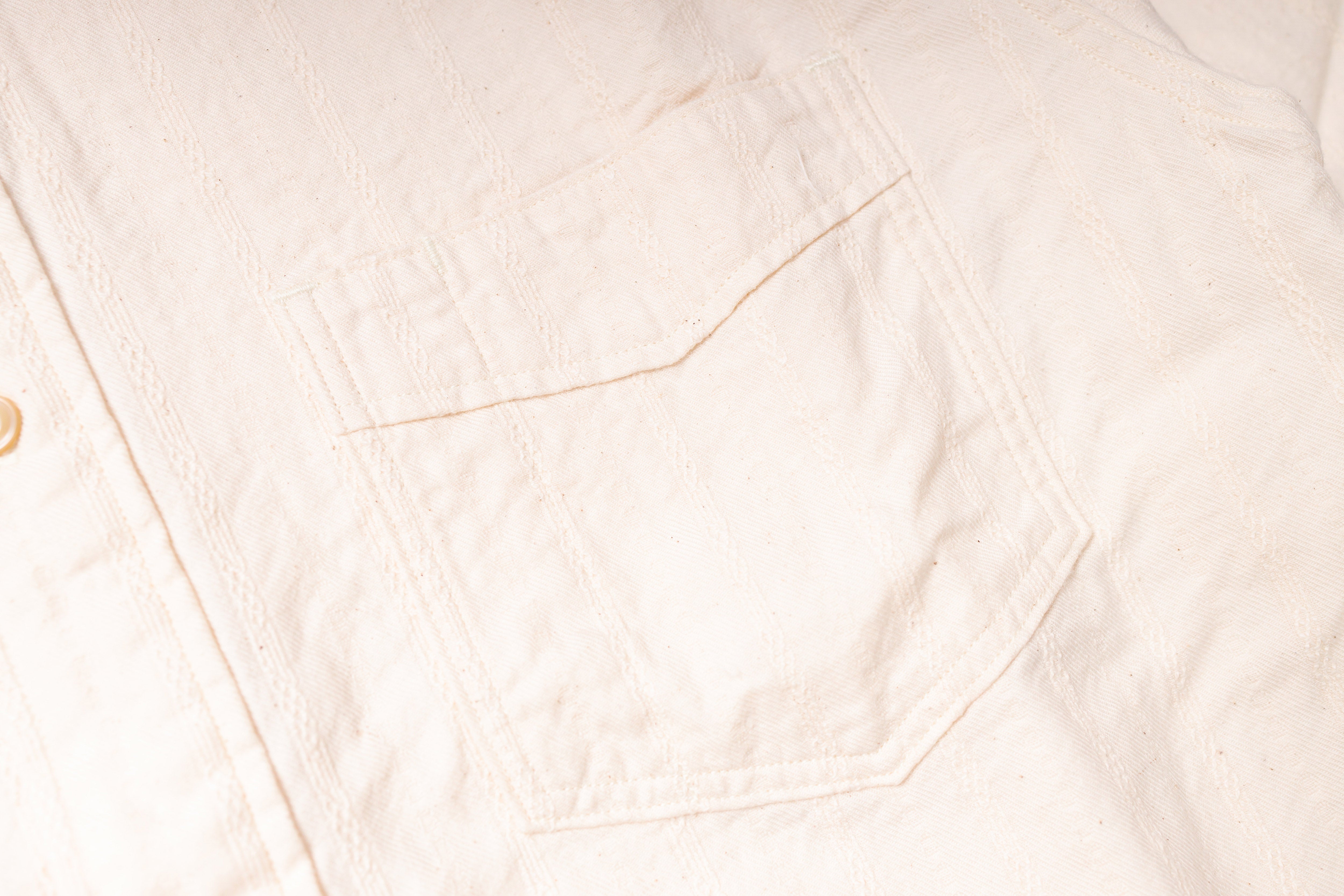 Close-up of a light pink fabric texture