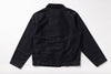 A black long-sleeve utility jacket shown from the back, laid flat against a clean white background.