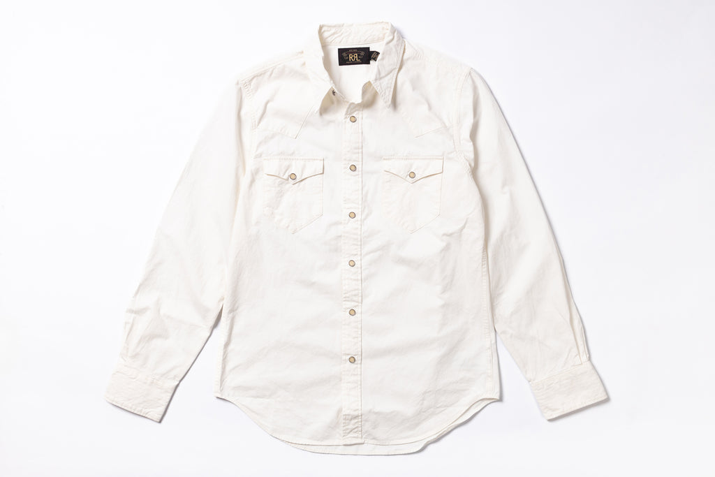An off-white long-sleeve button-down shirt with two buttoned chest pockets, laid flat on a white background.
