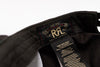Close-up of a black Ralph Lauren garment interior showing the brand label and care tag.