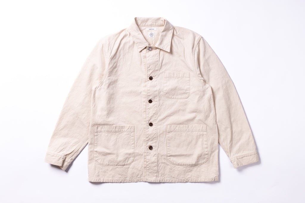 Beige jacket with button details on a white background