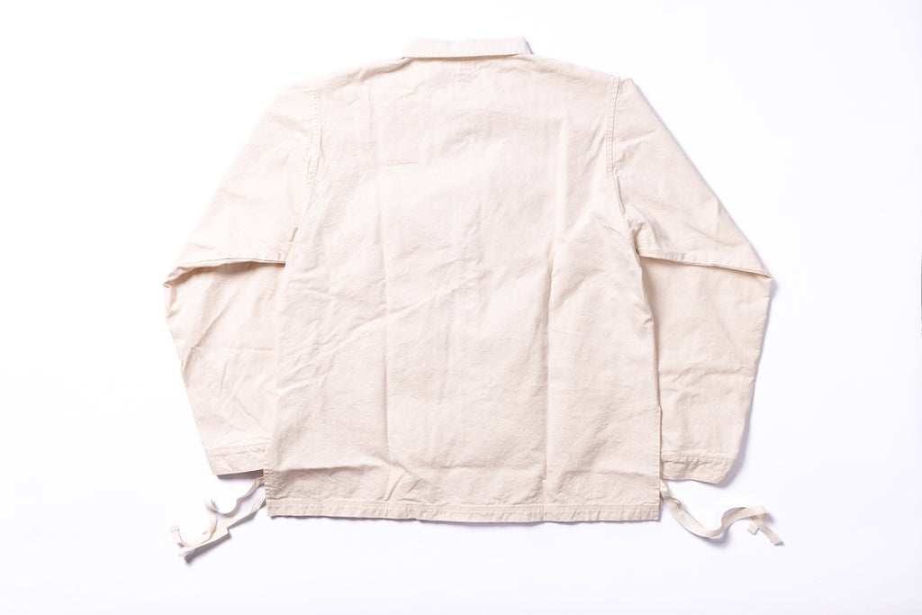 Beige jacket on a white background