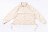 Beige jacket with drawstrings on a white background