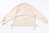 Beige long-sleeve shirt with drawstrings on a white background