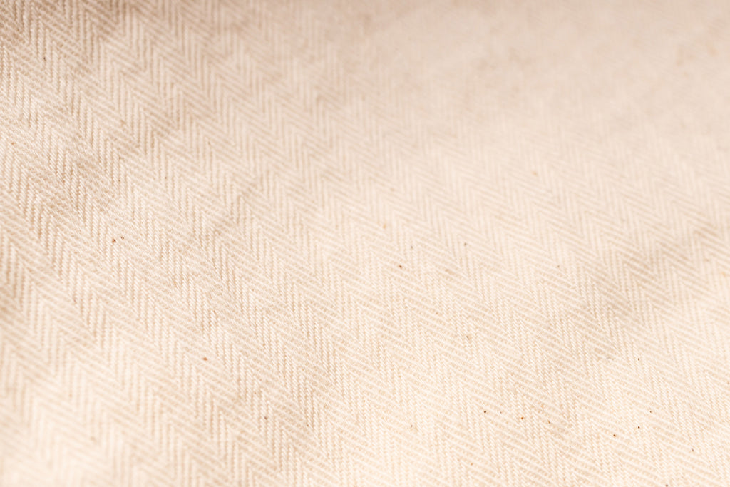Beige fabric texture with a subtle pattern
