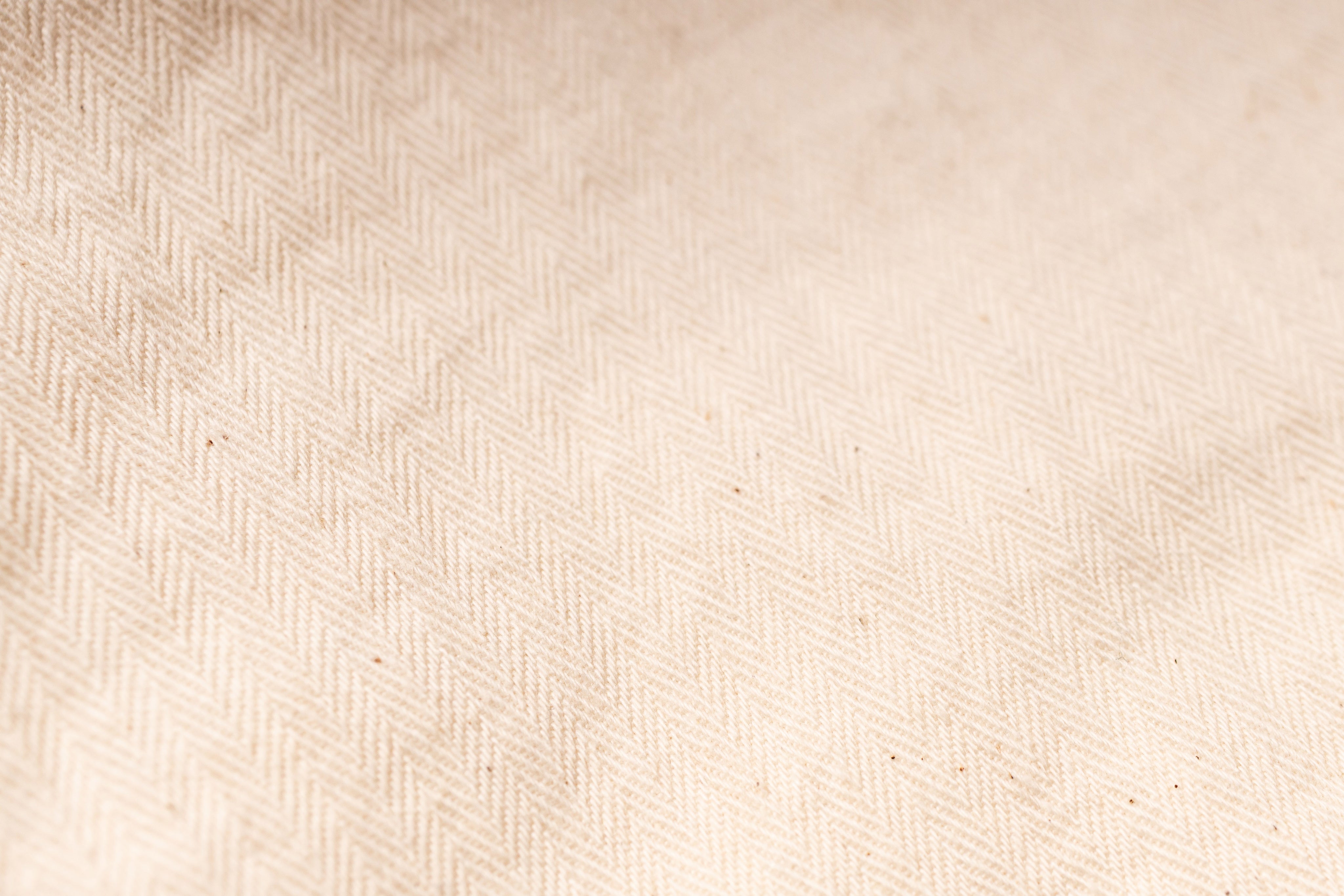 Beige fabric texture with a subtle pattern
