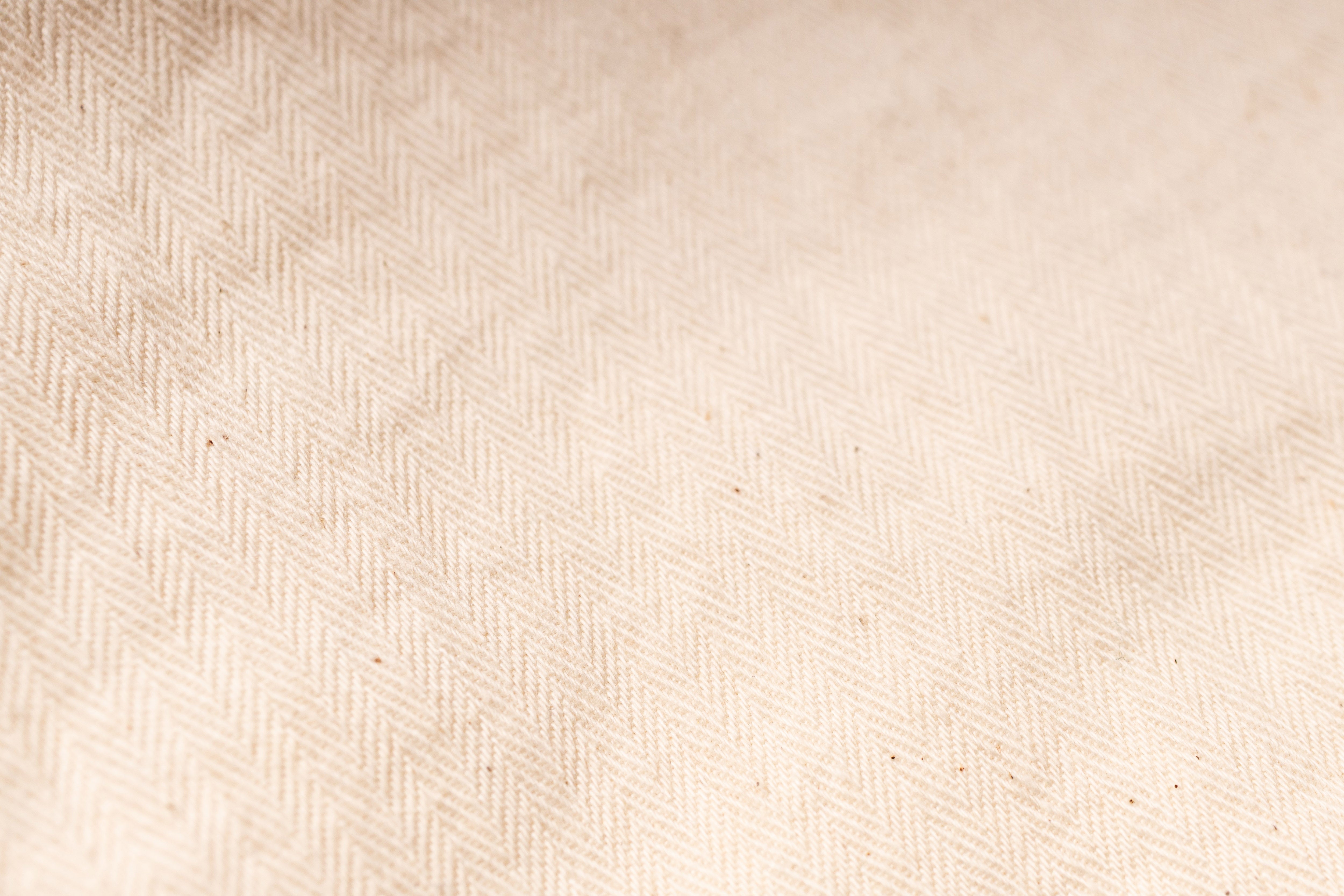 Beige fabric texture with a subtle pattern