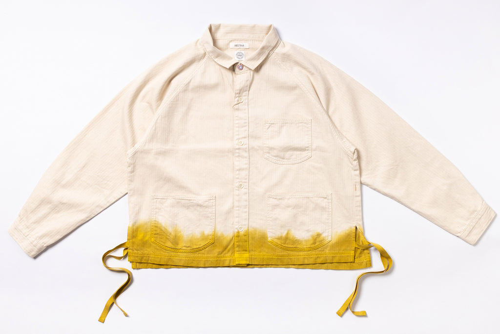 Beige jacket with yellow gradient hem on a white background