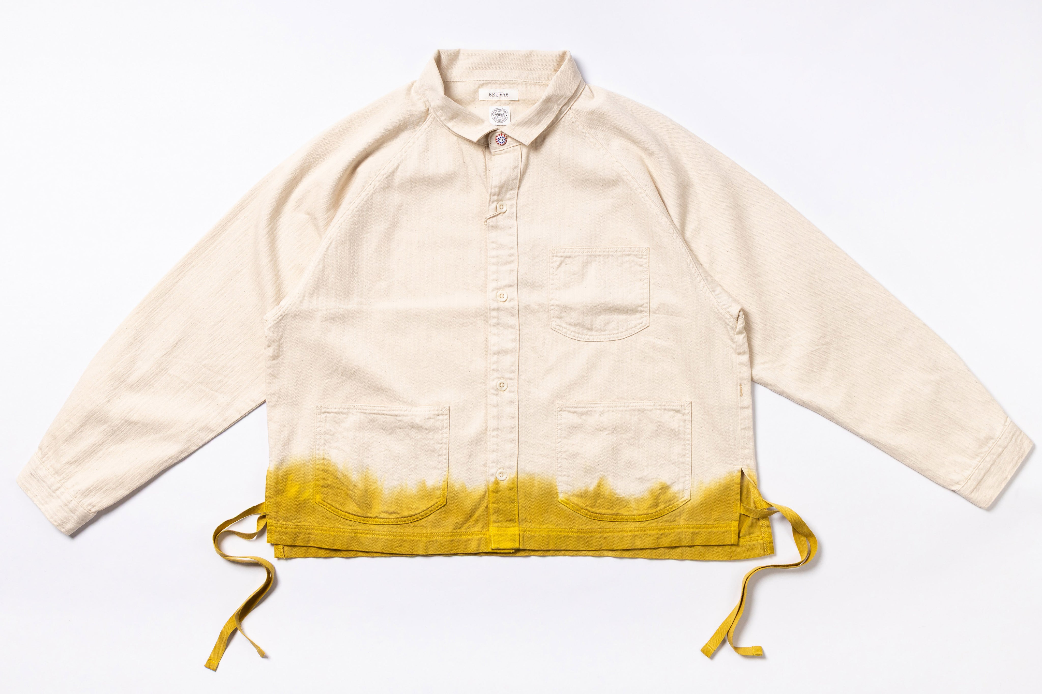Beige jacket with yellow gradient hem on a white background