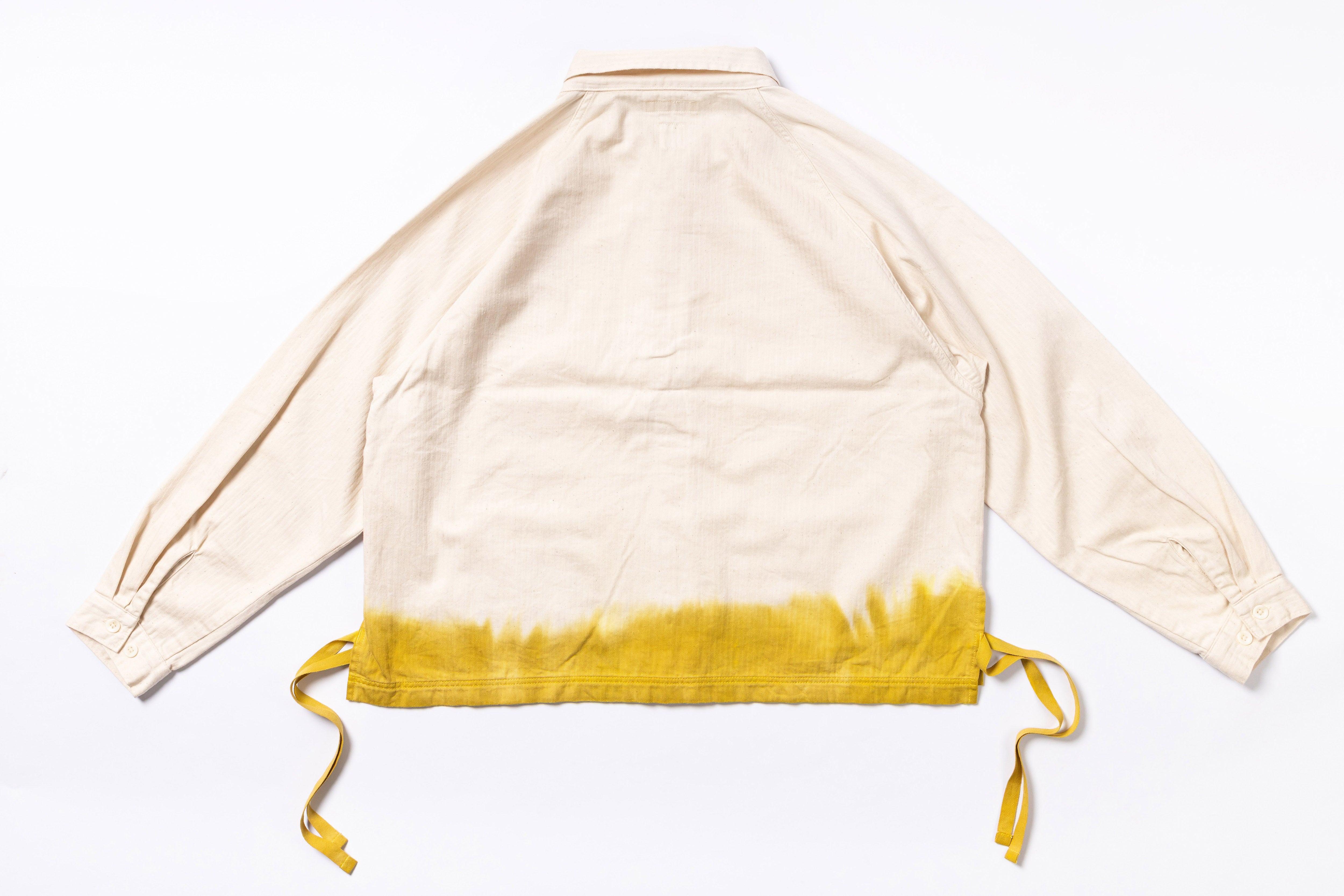 Beige jacket with yellow trim on a white background