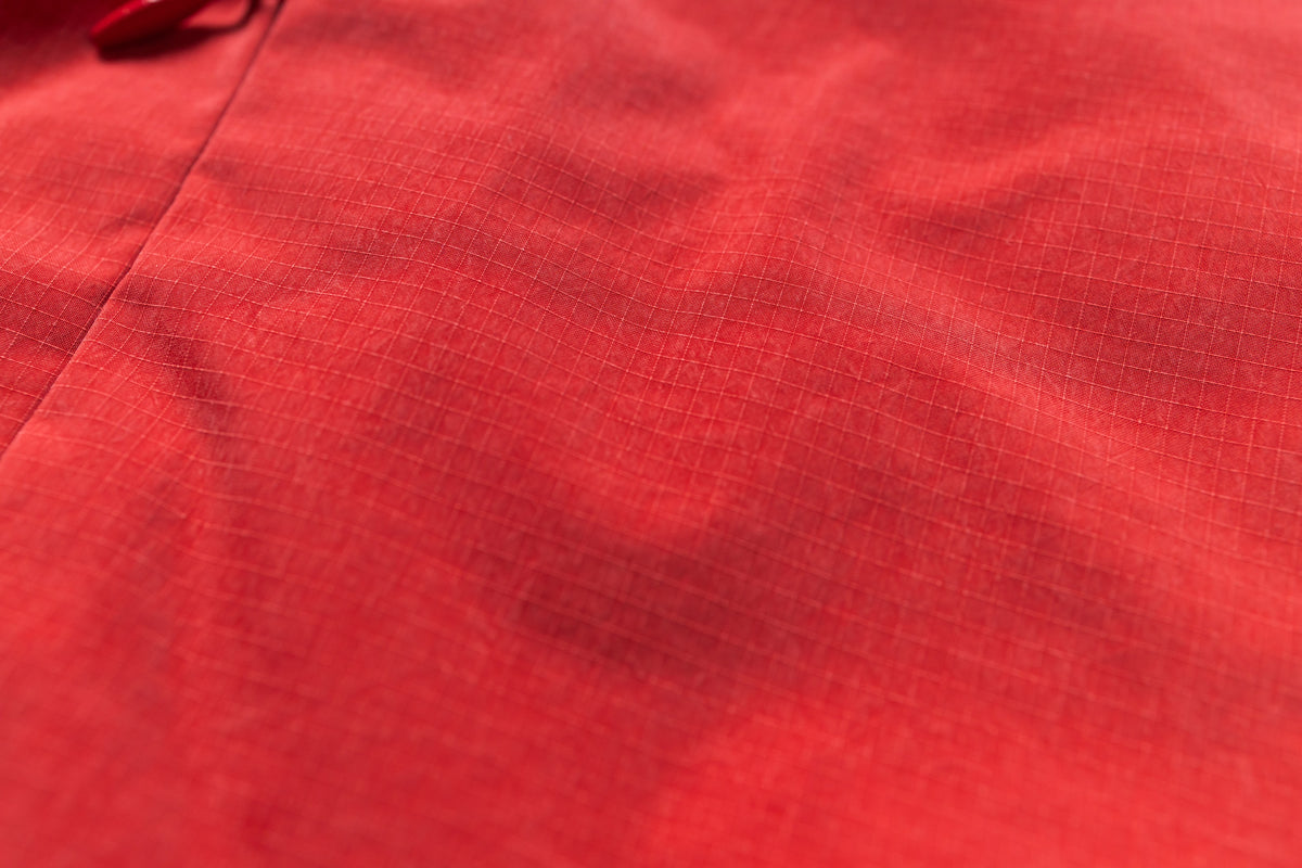 Close-up of red fabric with visible texture
