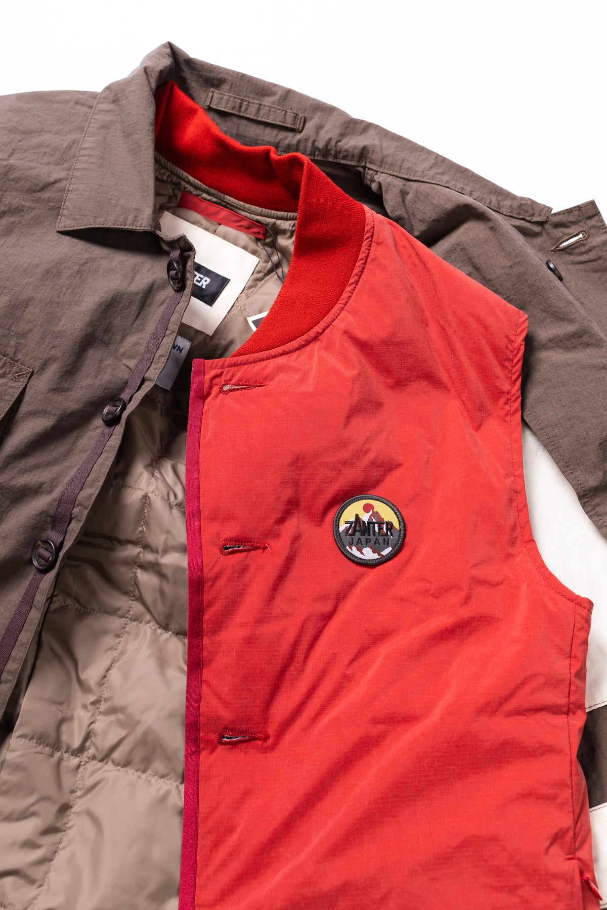 Red vest with a logo on a white background