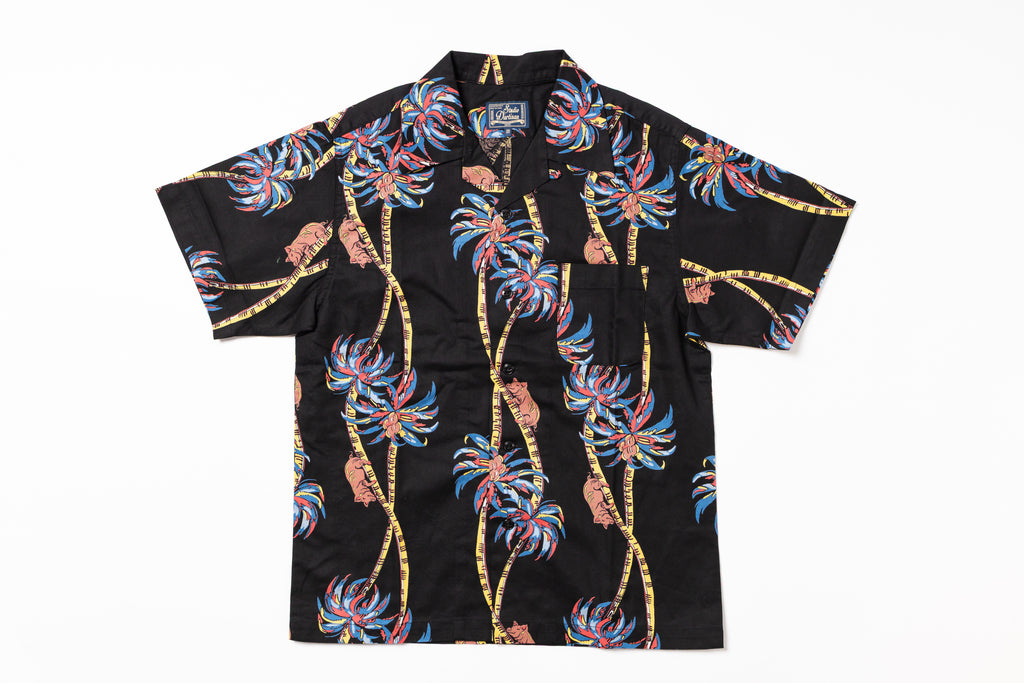 Black Hawaiian shirt with colorful palm tree design on a white background