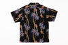 Black shirt with colorful palm tree pattern on a white background