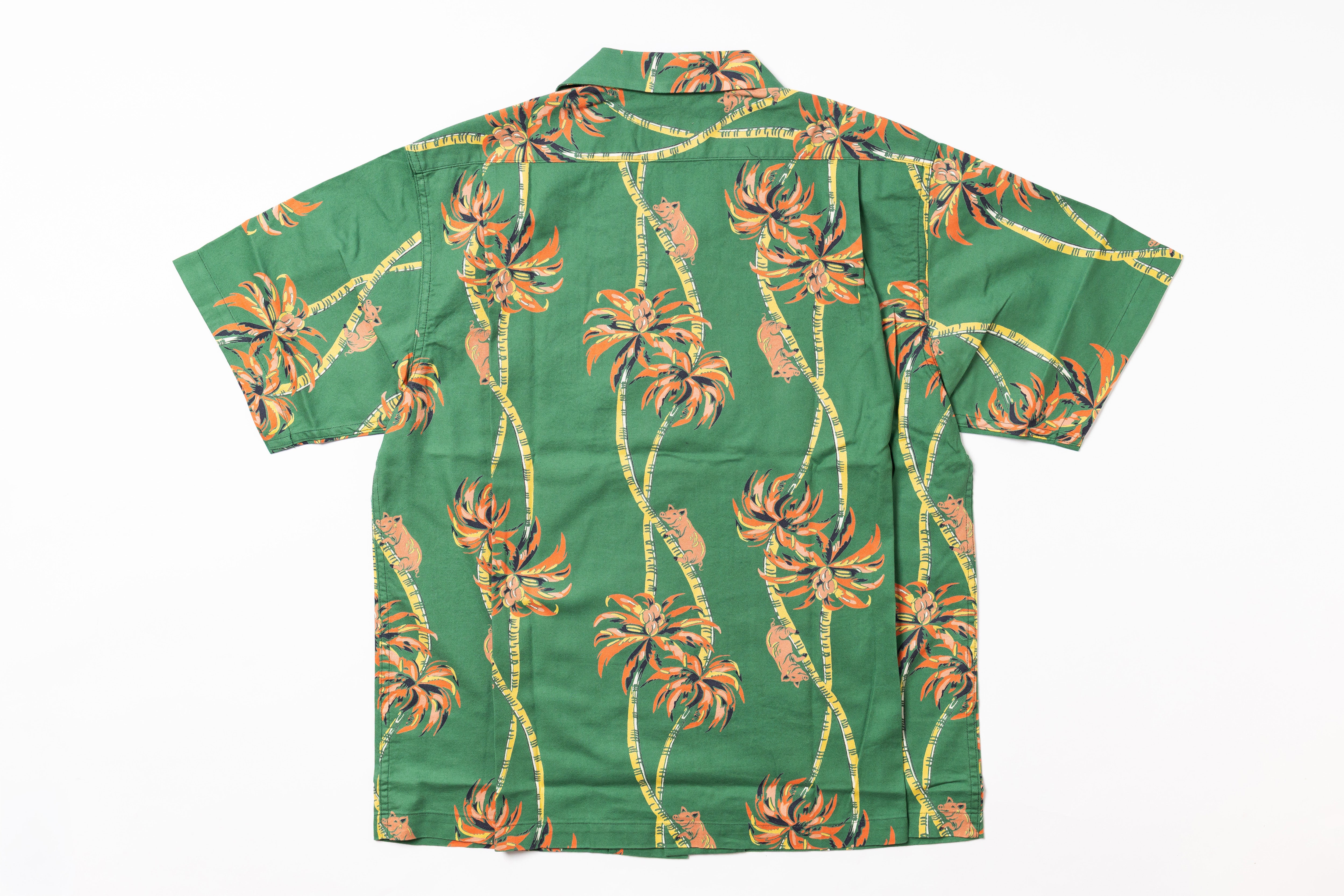 Green shirt with floral pattern on a white background