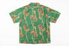 Green shirt with floral pattern on a white background