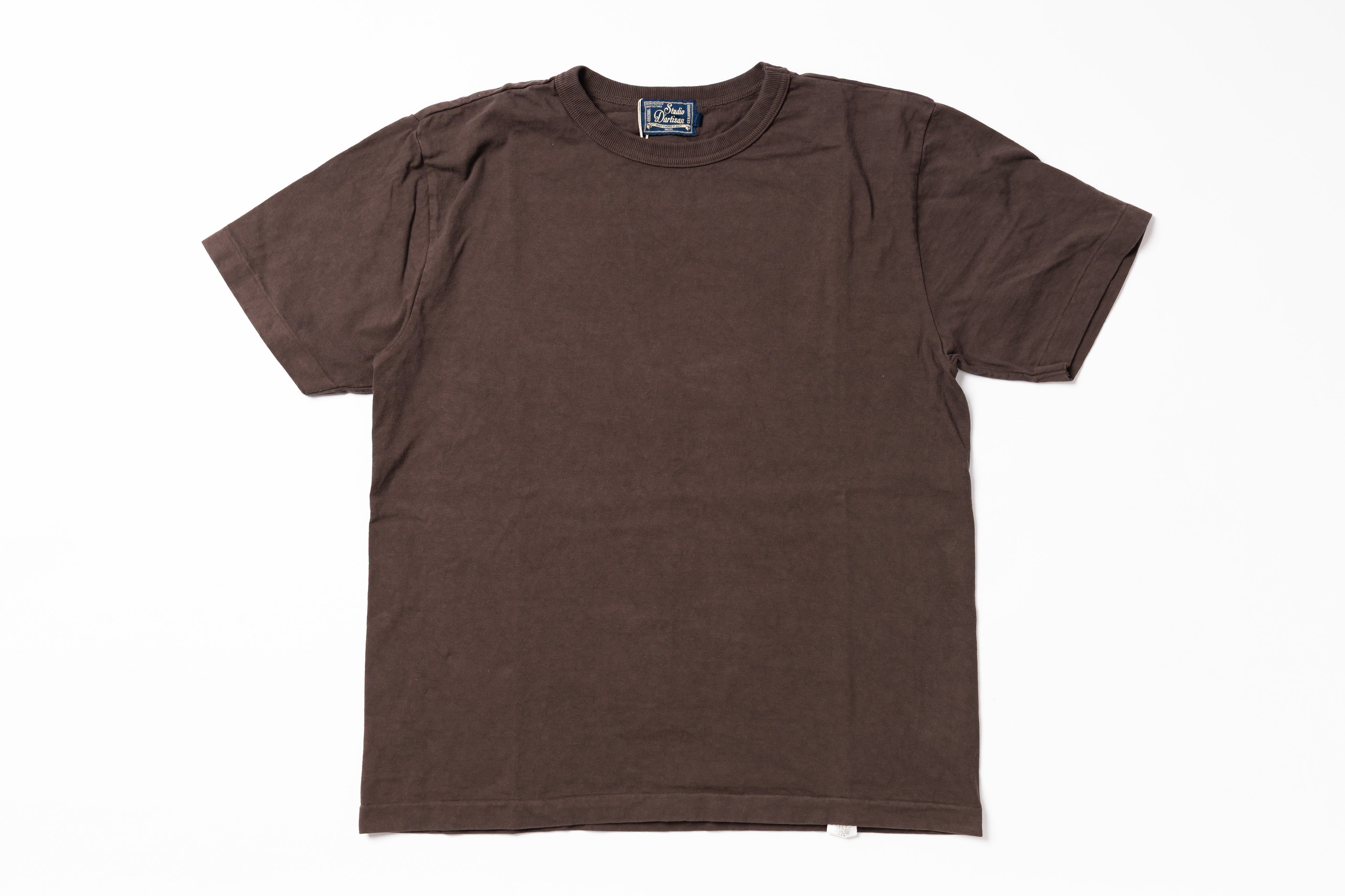 A dark brown short-sleeve crewneck t-shirt laid flat against a solid white background.