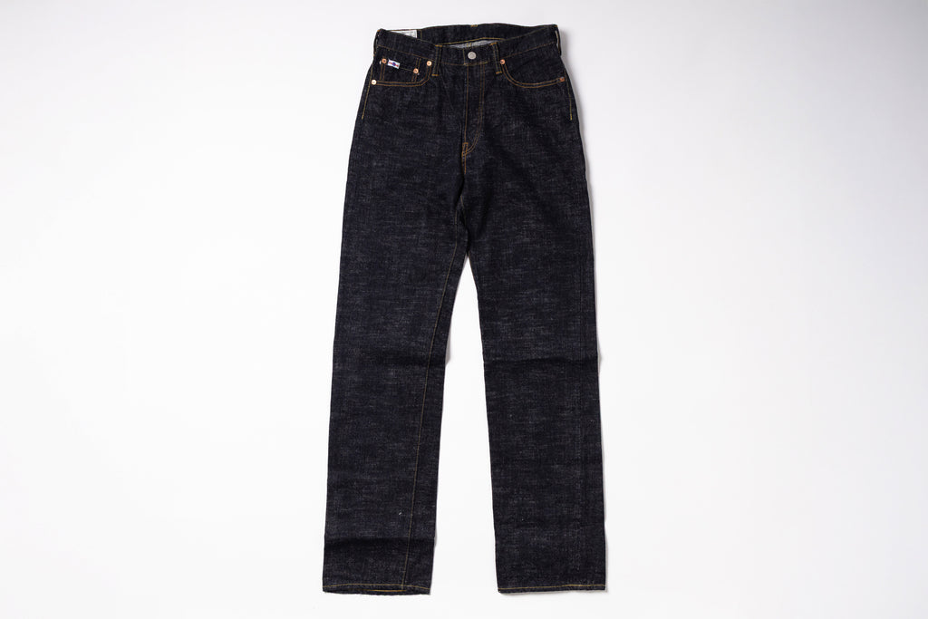 Pair of dark blue jeans on a white background