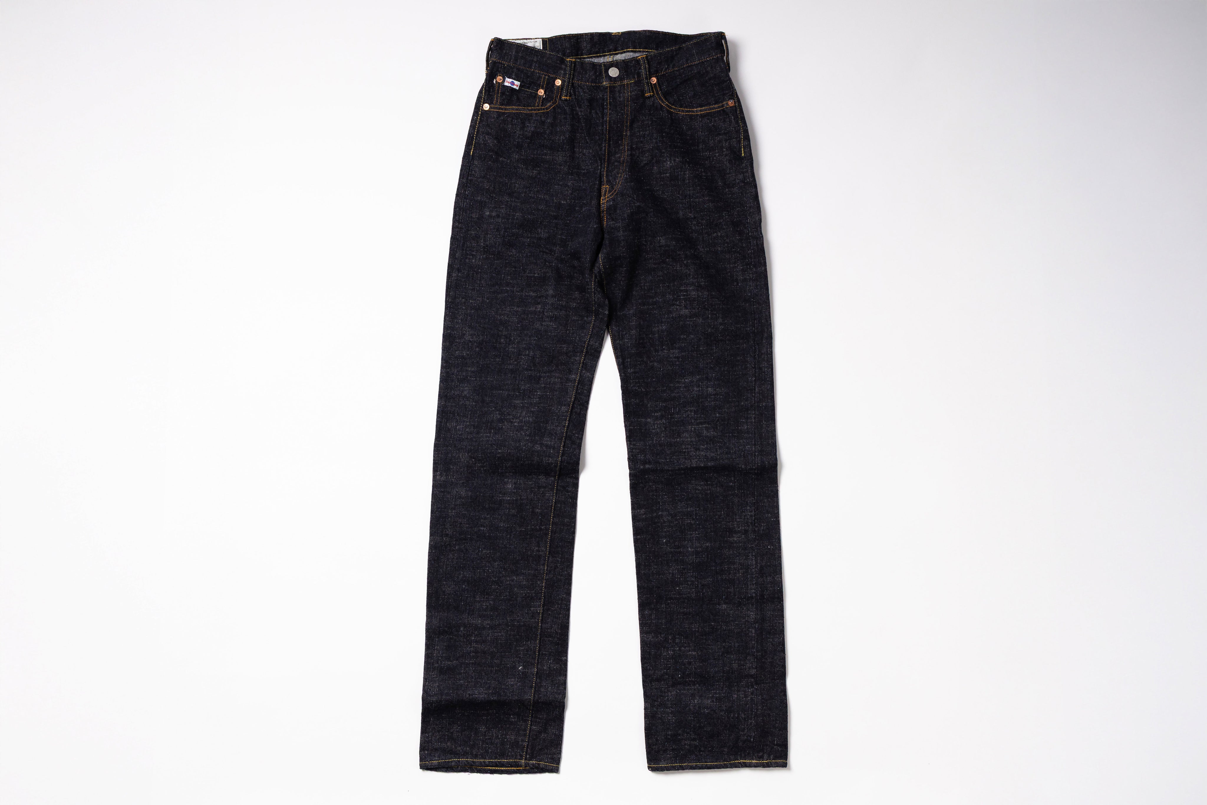Pair of dark blue jeans on a white background