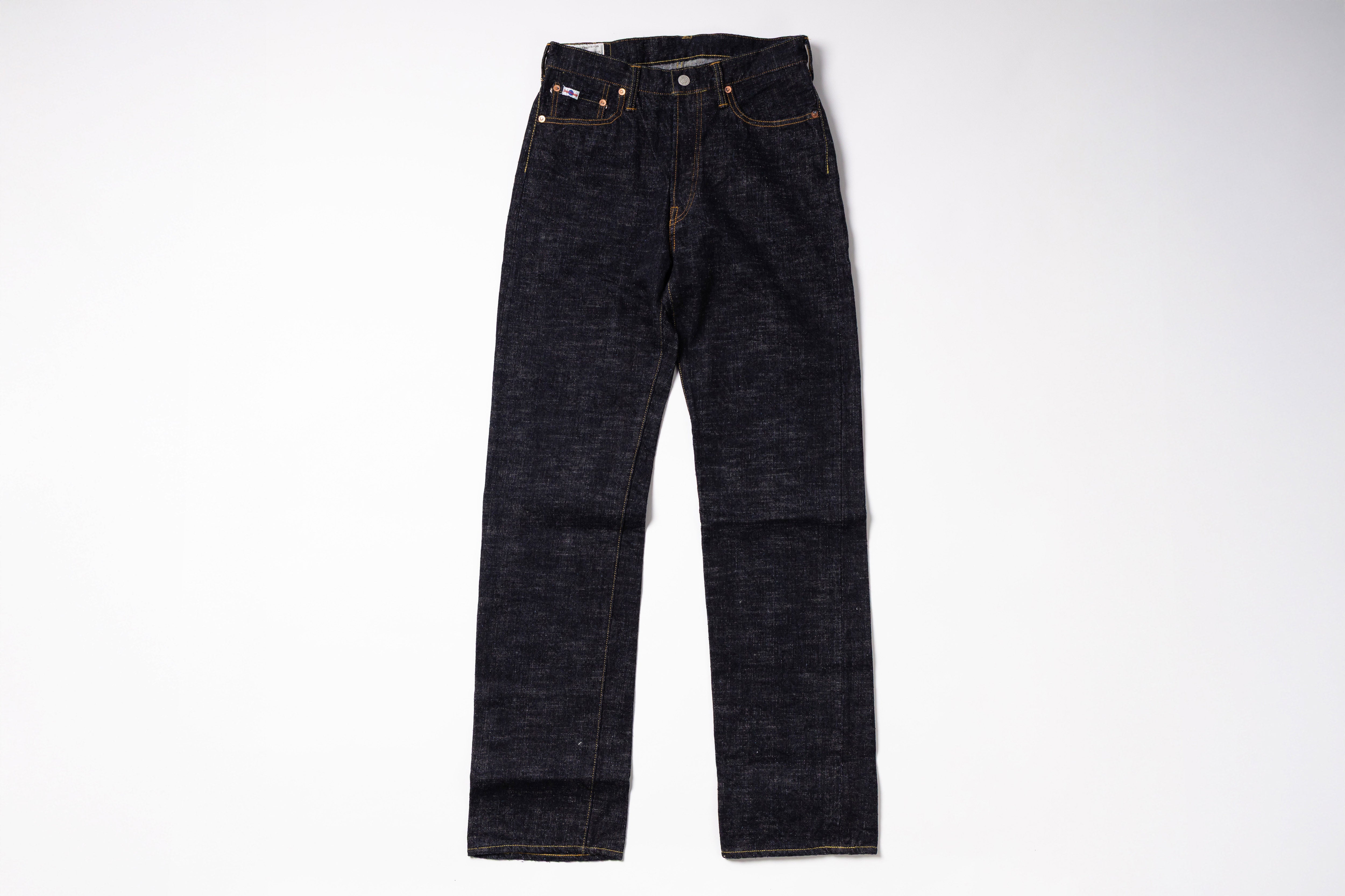 Pair of dark blue jeans on a white background