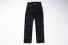 Pair of dark blue jeans on a white background