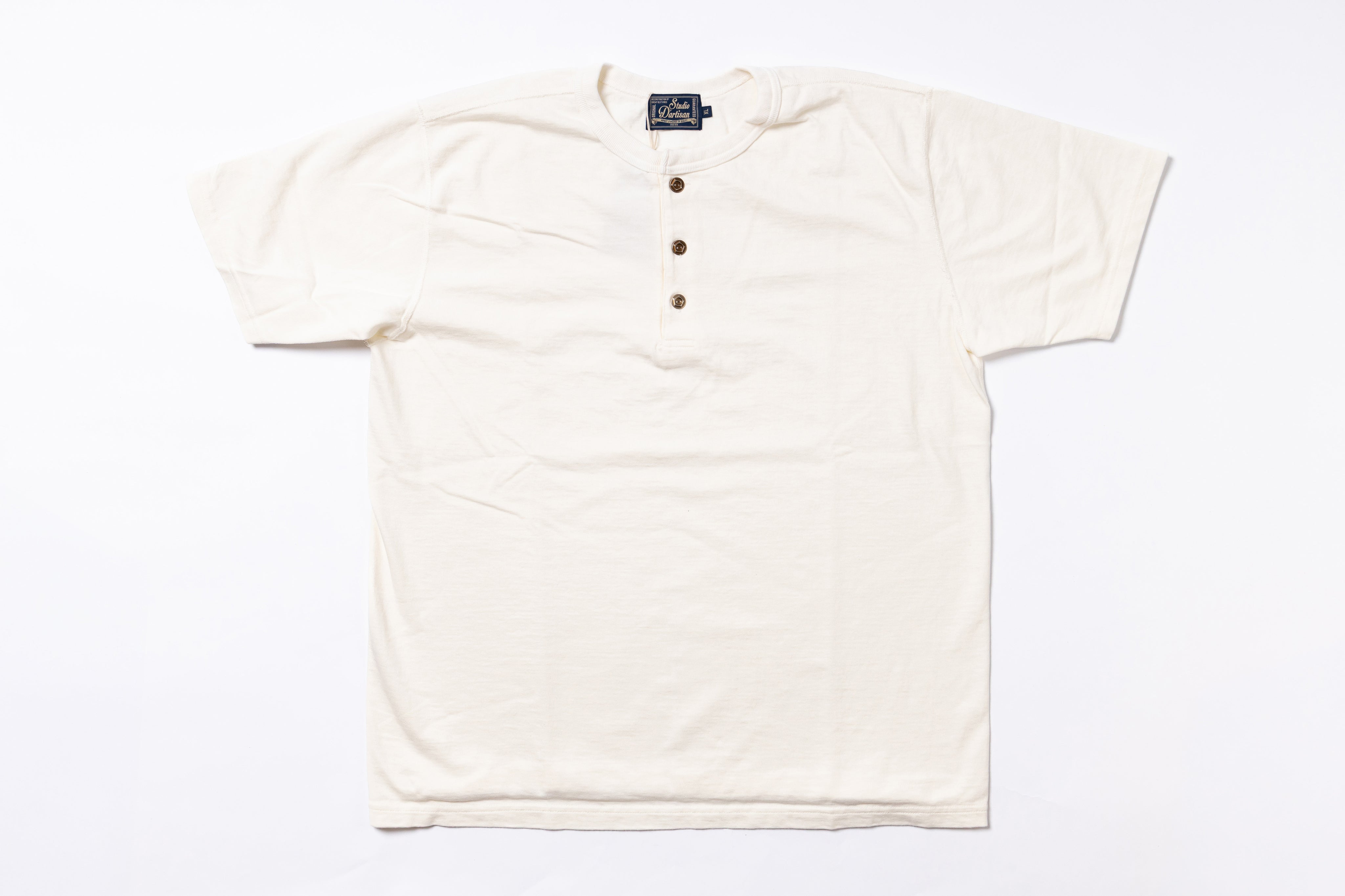 White henley shirt with buttons on a white background