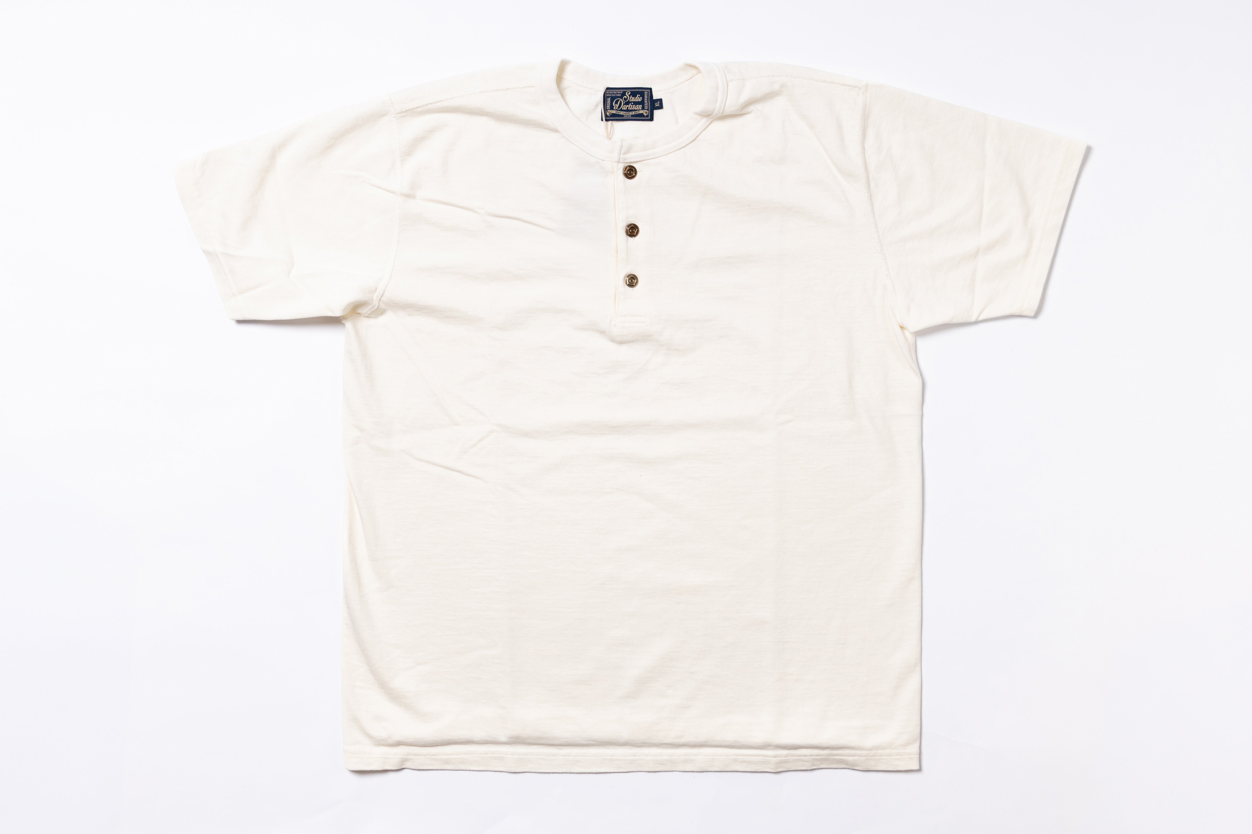 White henley shirt with buttons on a white background