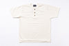 White henley shirt with buttons on a white background
