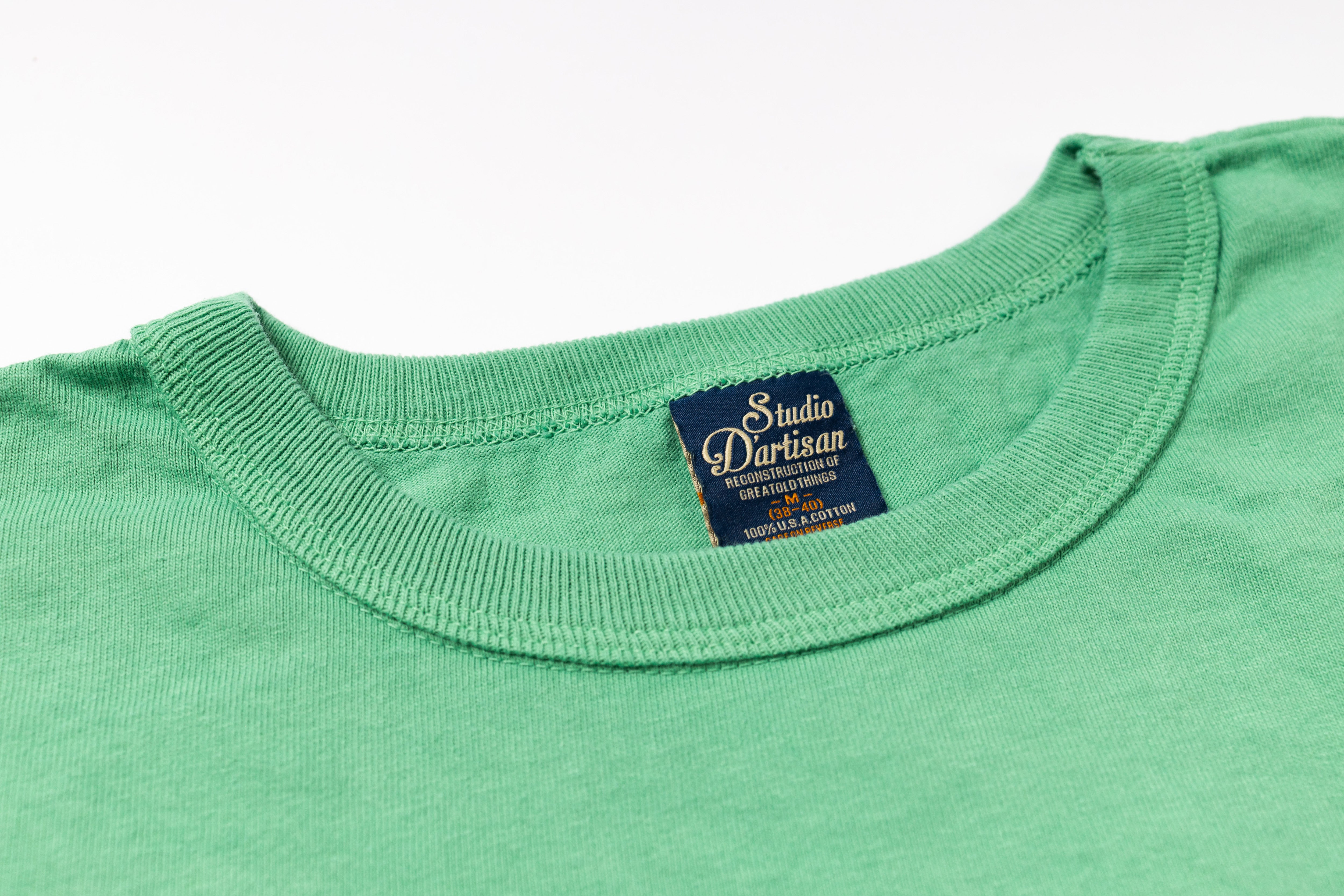Green T-Shirt on a white background