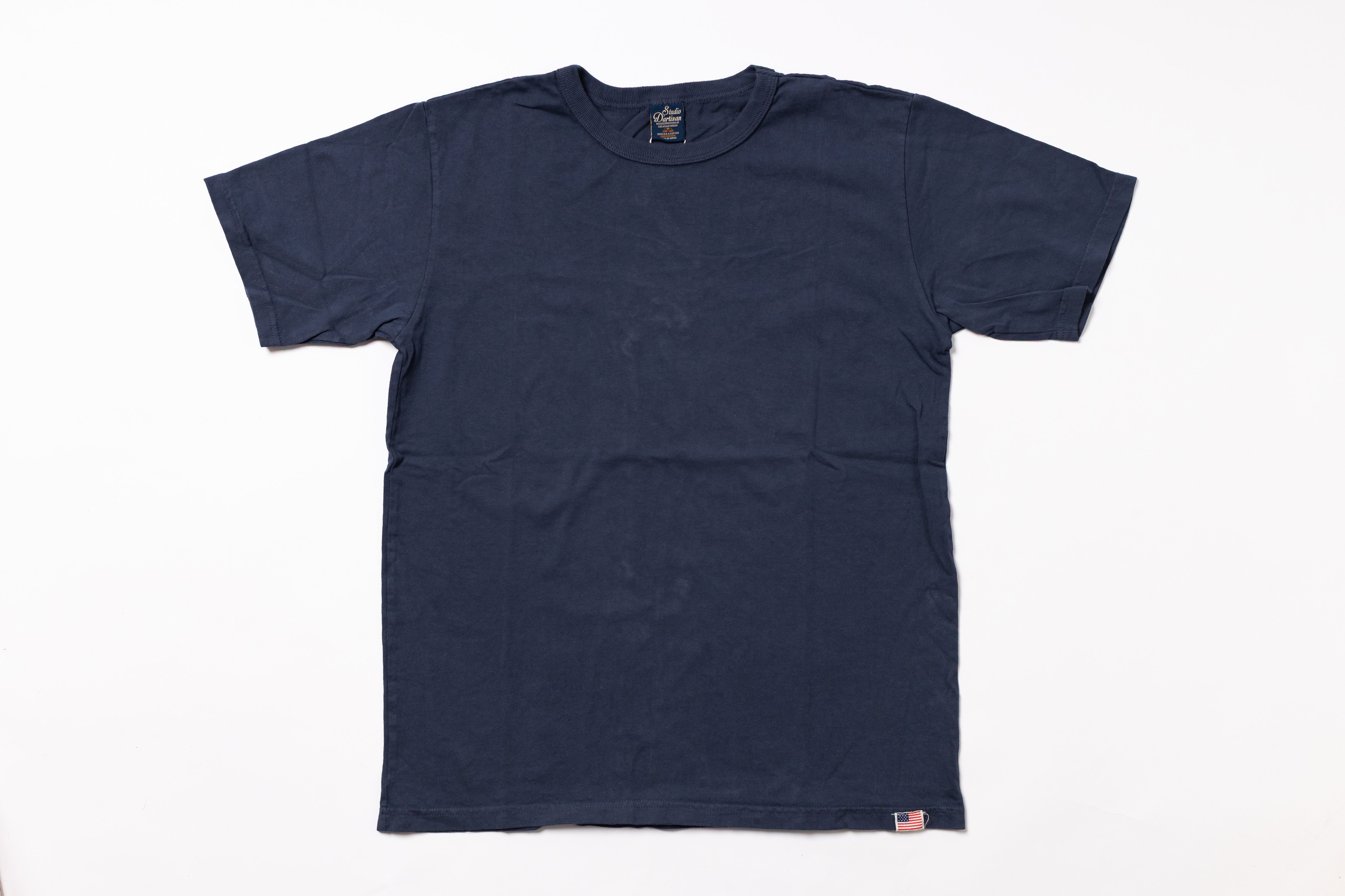 Navy blue t-shirt on a white background