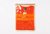 Orange t-shirt with text on packaging against a white background