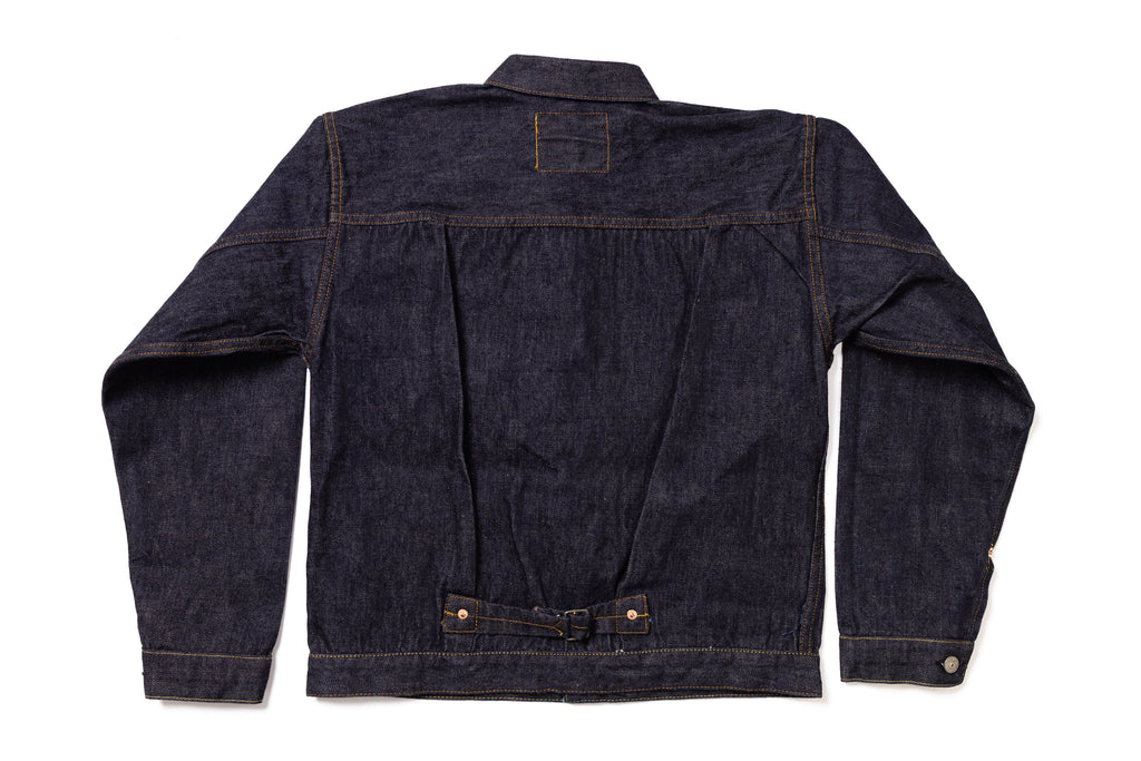 Dark blue denim jacket on a white background