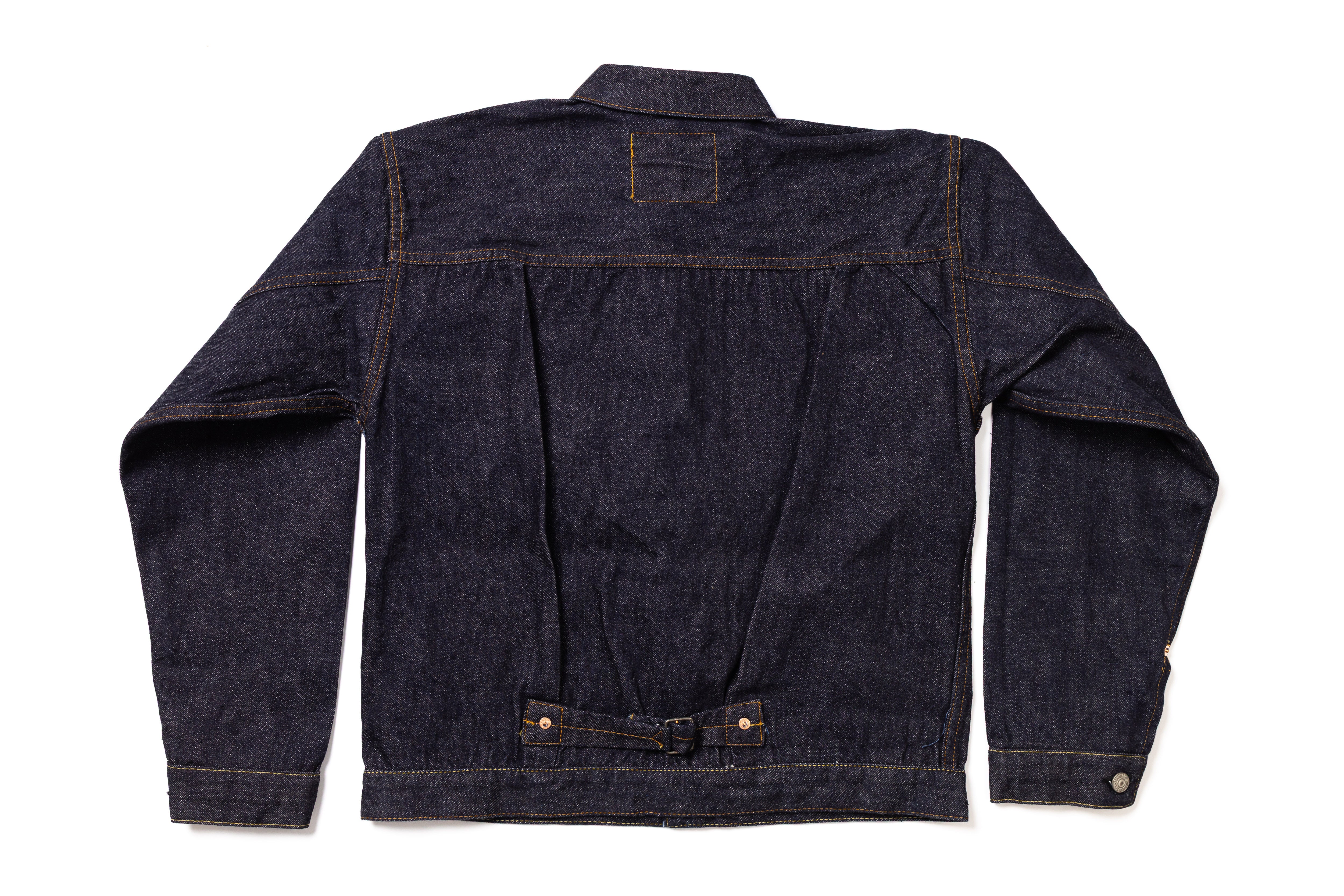 Dark blue denim jacket on a white background