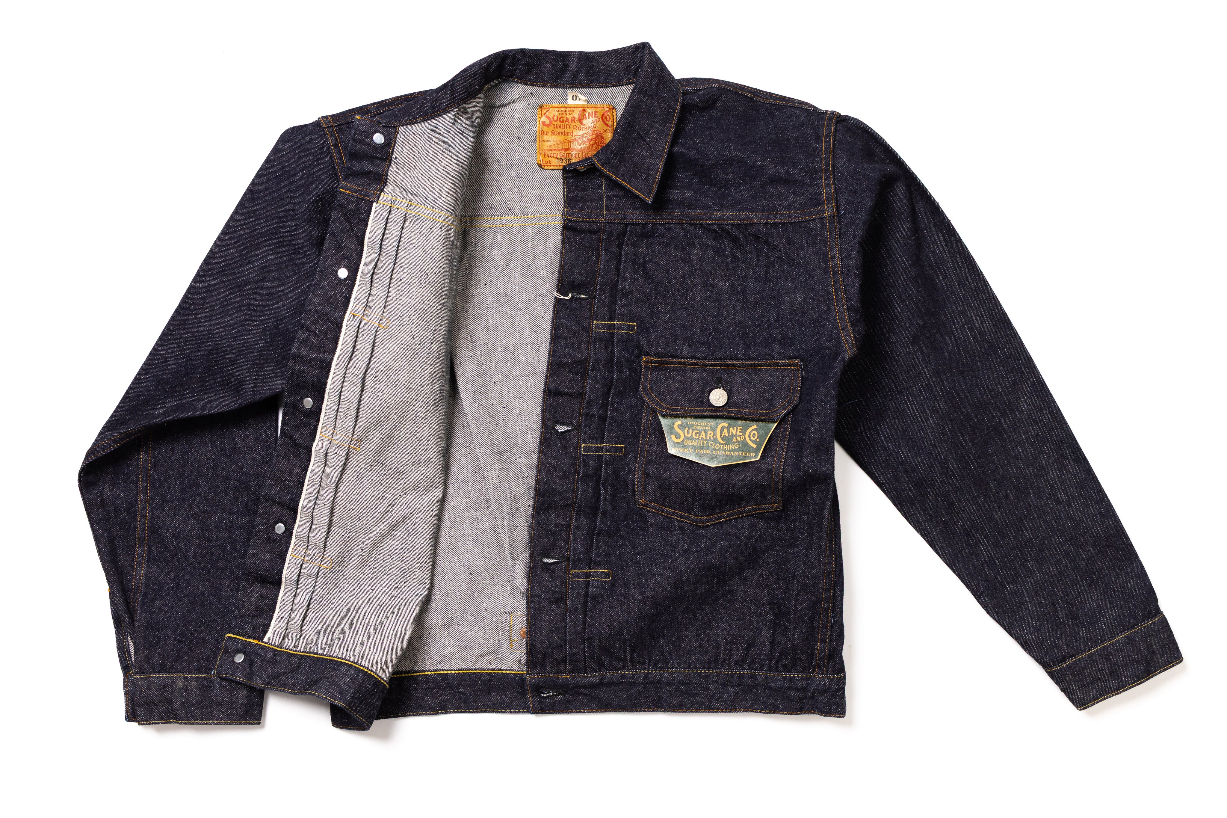 Denim jacket with a visible brand label on a white background