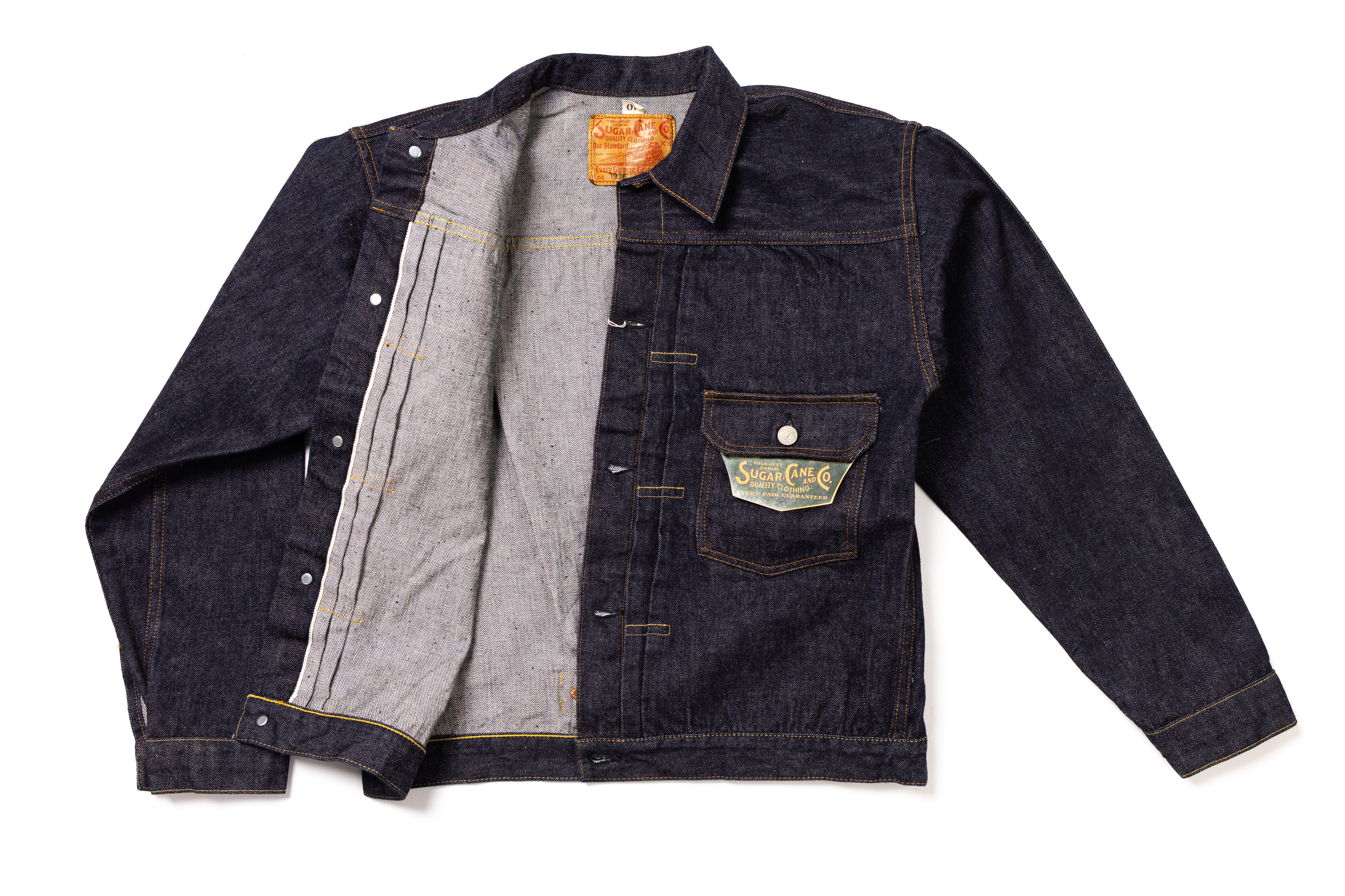 Denim jacket with a visible brand label on a white background