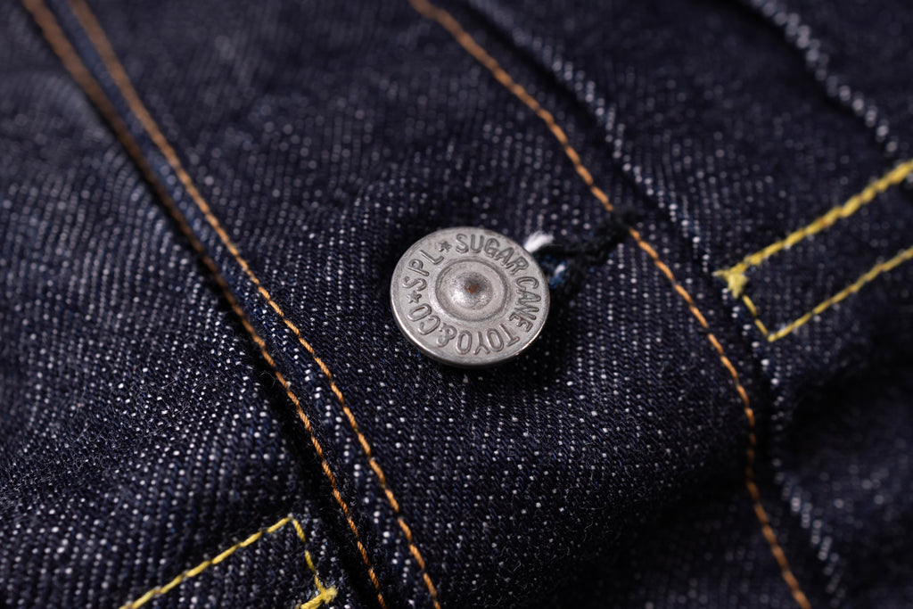 Button of a denim jacket