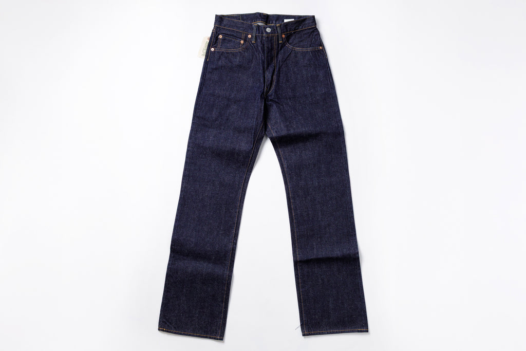 Pair of dark blue jeans on a white background