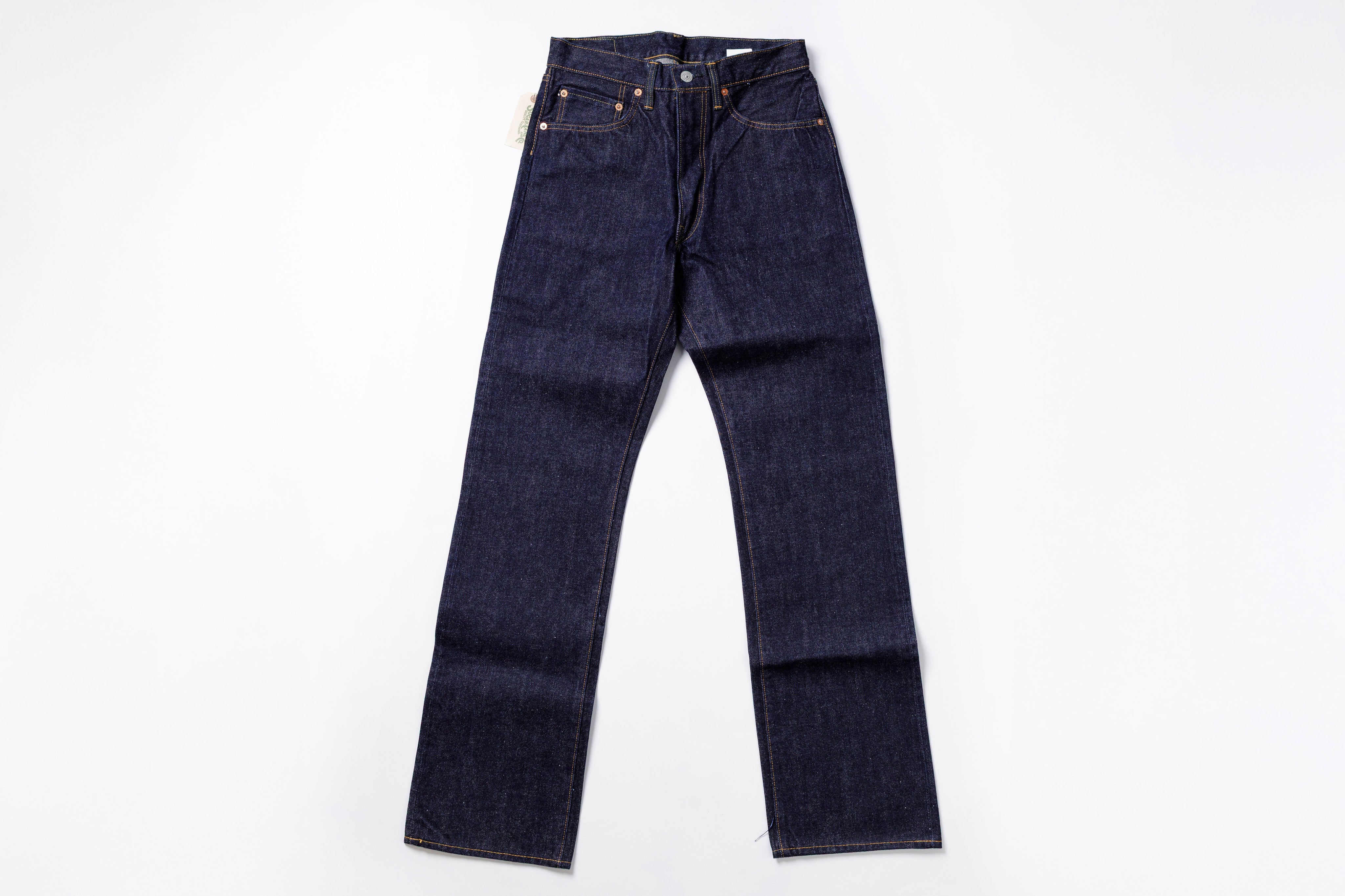 Pair of dark blue jeans on a white background
